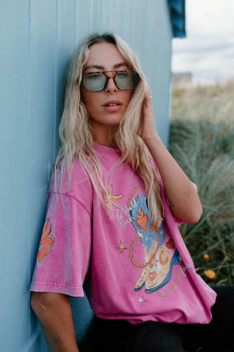 the world needs more cowgirls acid wash tee